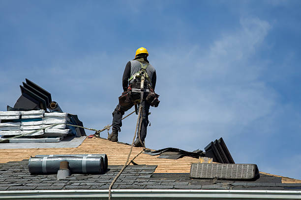 Professional Roof Replacement technician working in Warren, OR